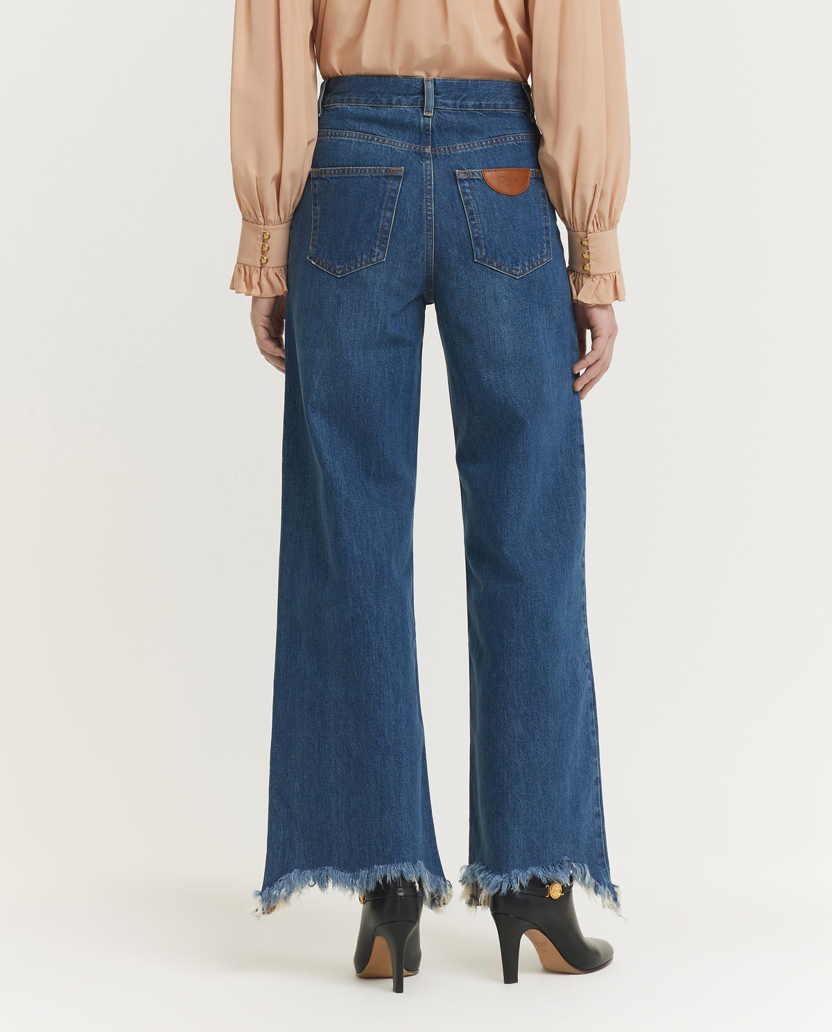 Wide Legged Damaged Jeans