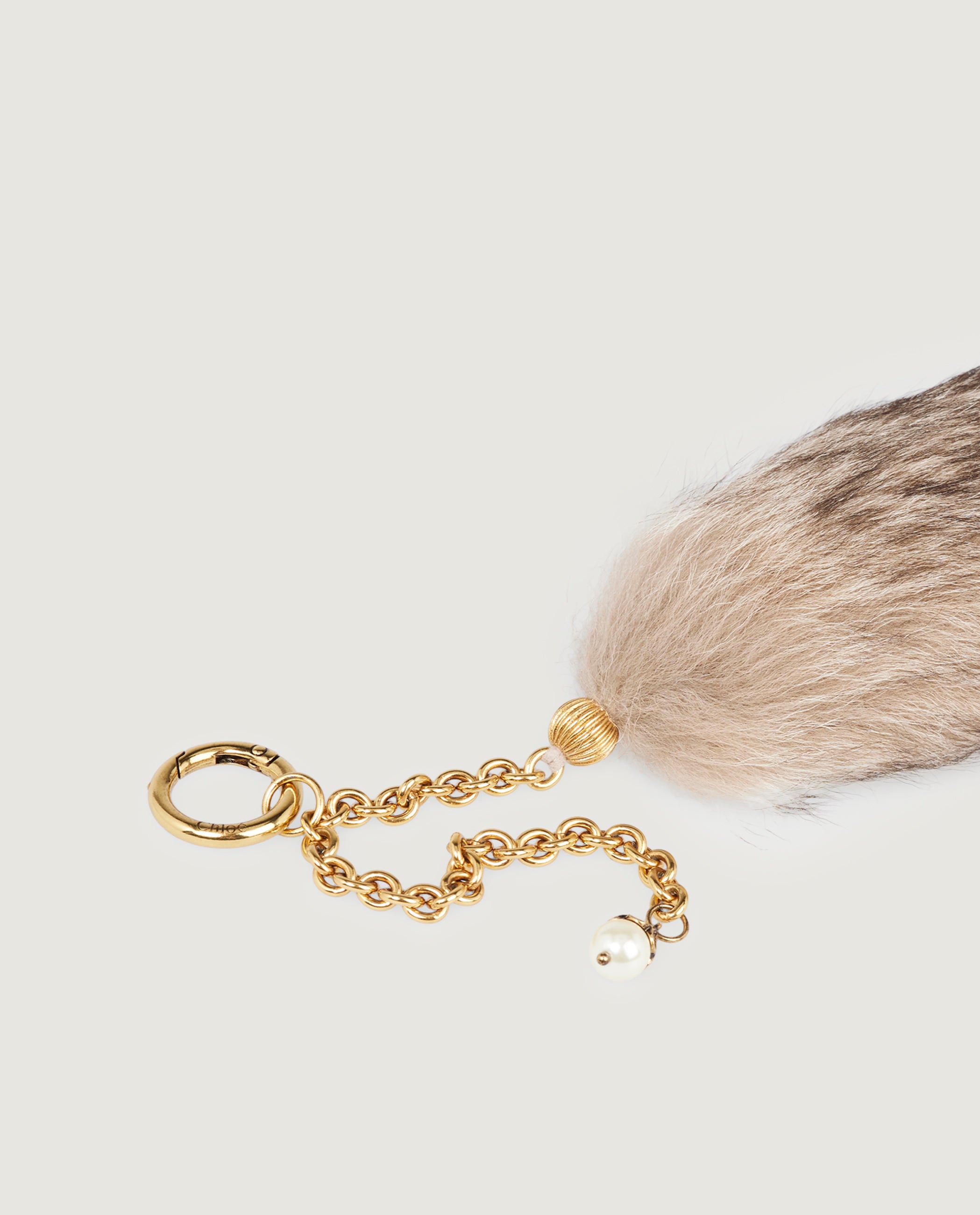 Shearling Treasure Tails Charm - Lichtbruin