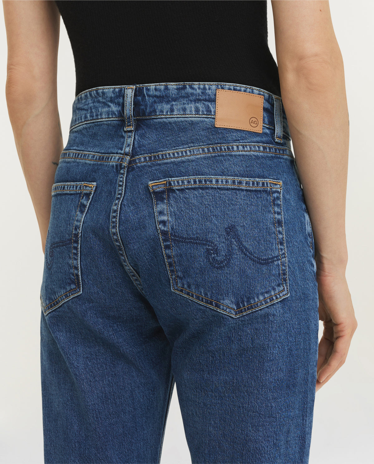 American Mid-Rise Slim Jeans