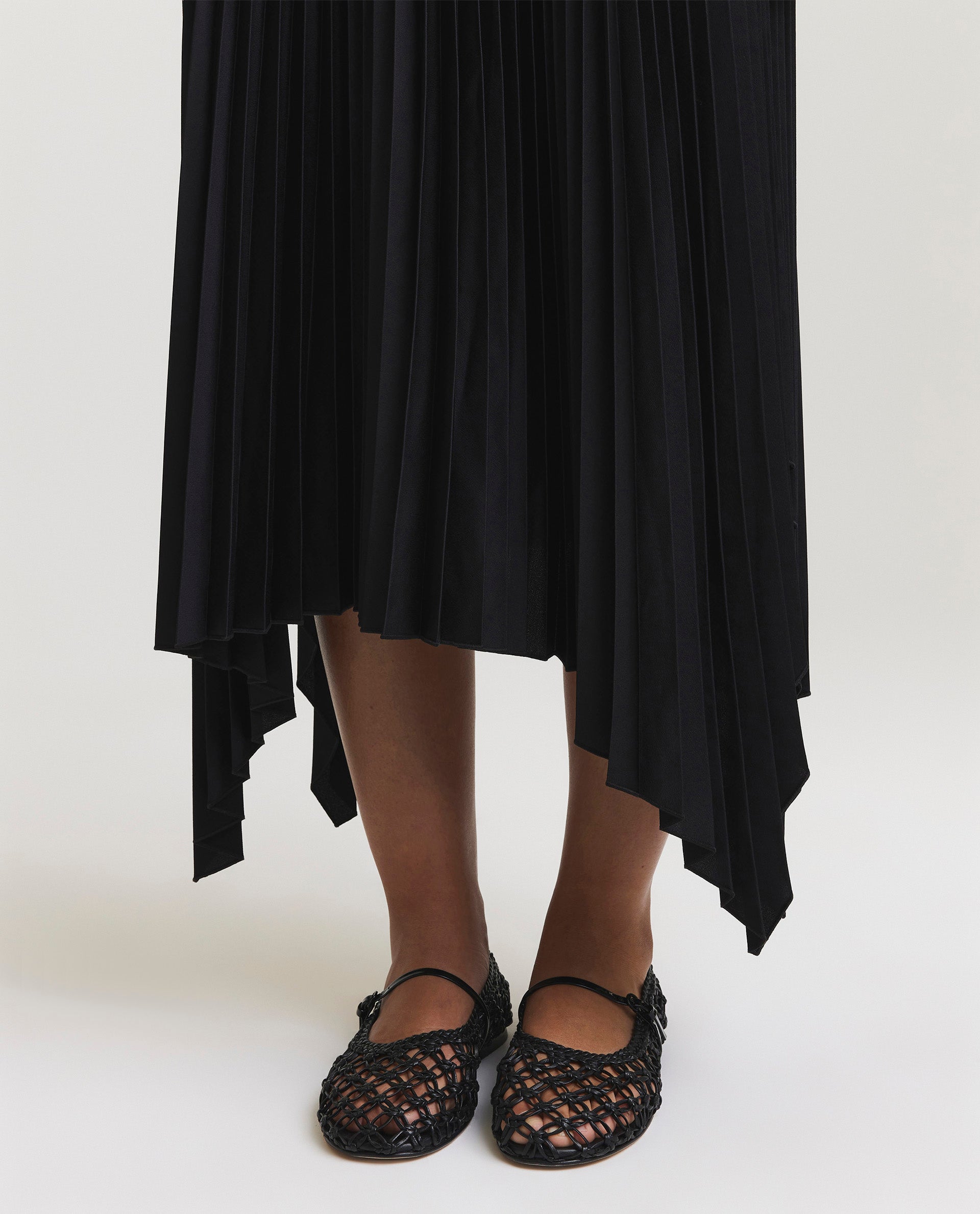 Asymmetrical plissé skirt