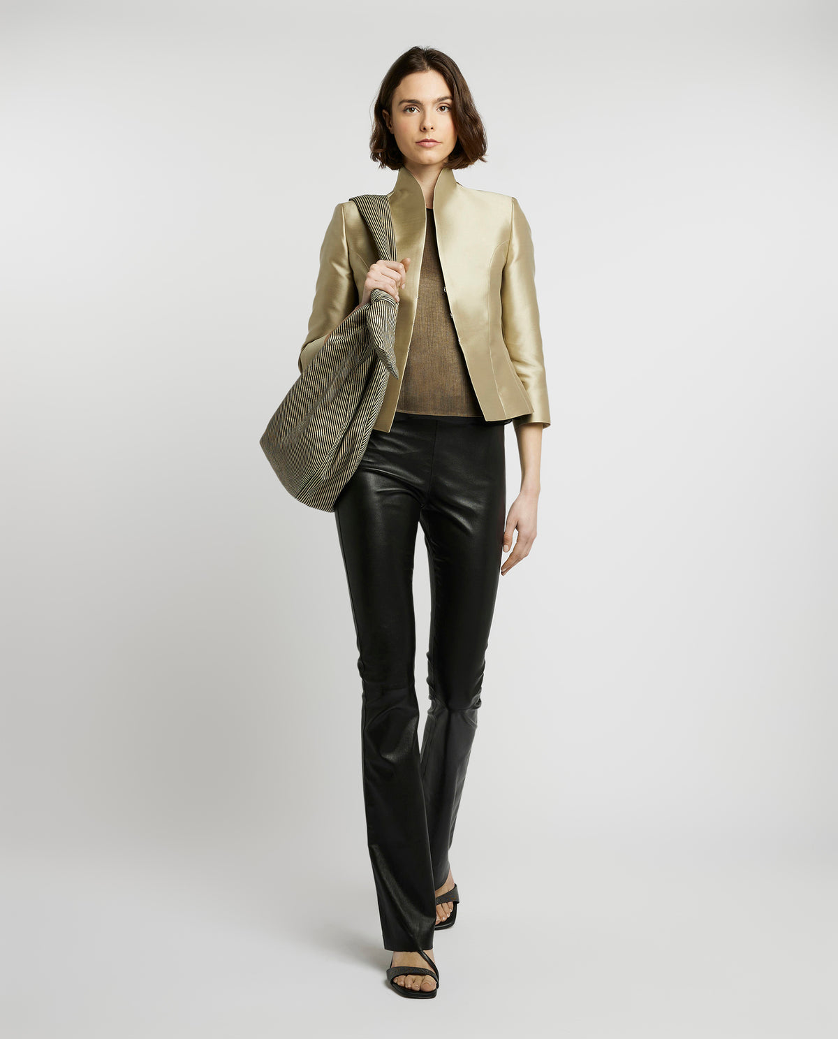 Flared trousers in stretch leather