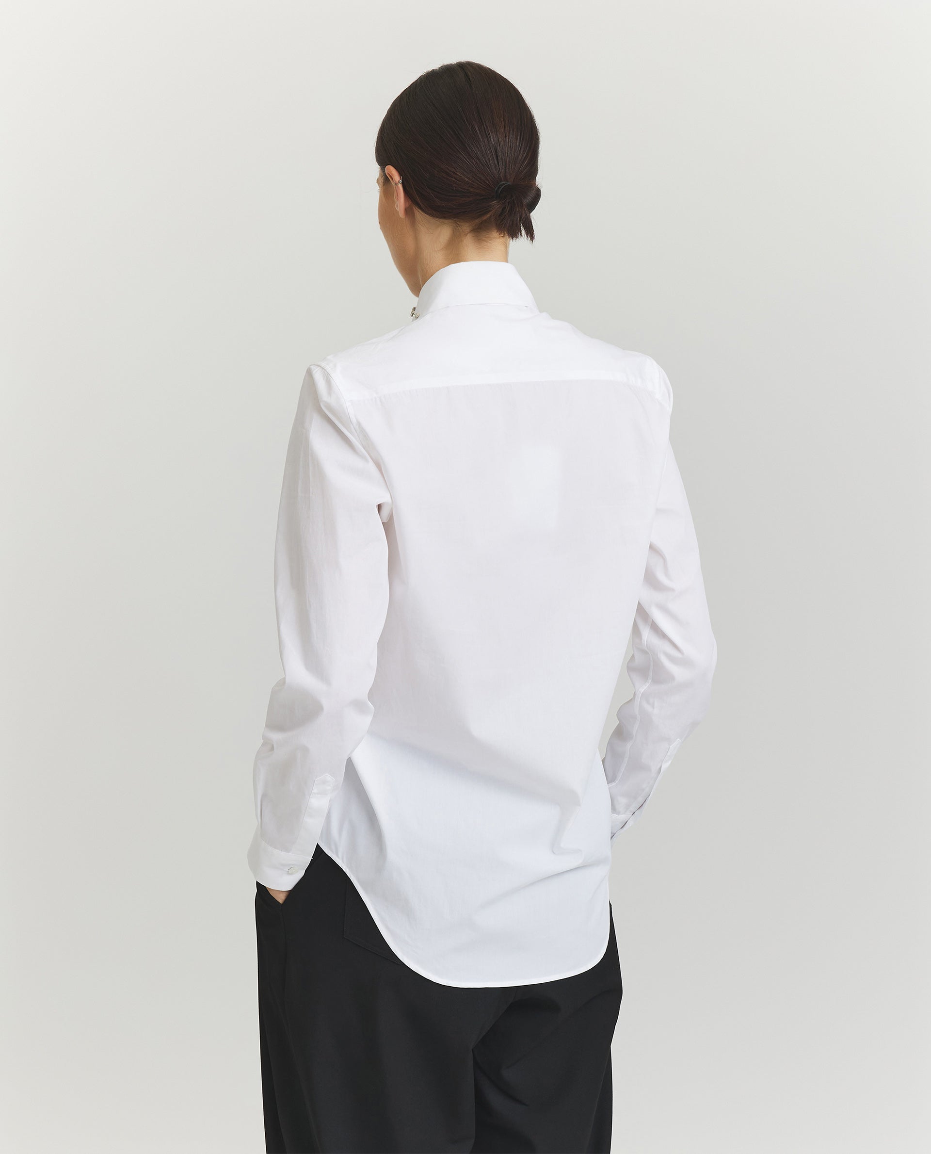 Recht vallende witte blouse