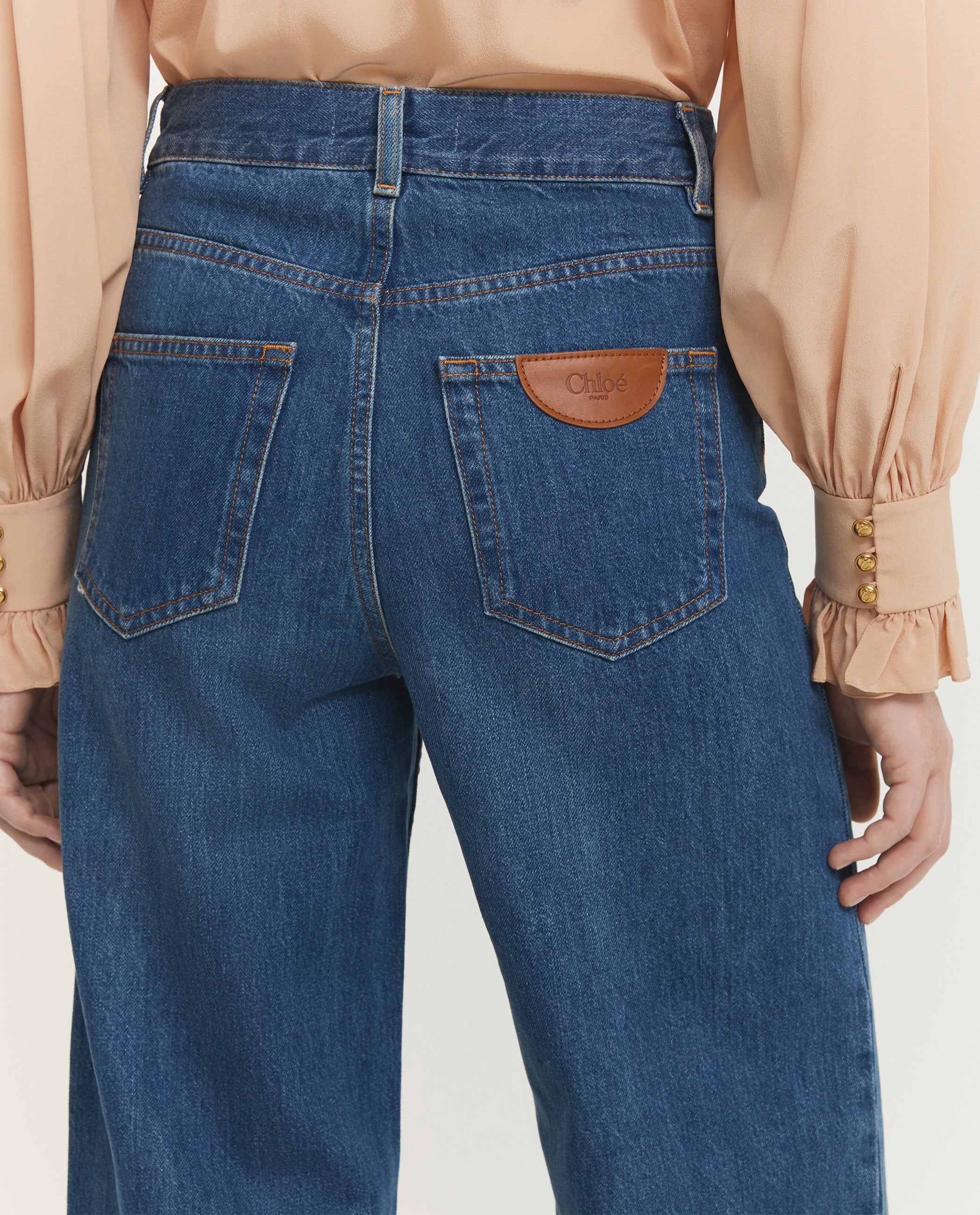 Wide Legged Damaged Jeans