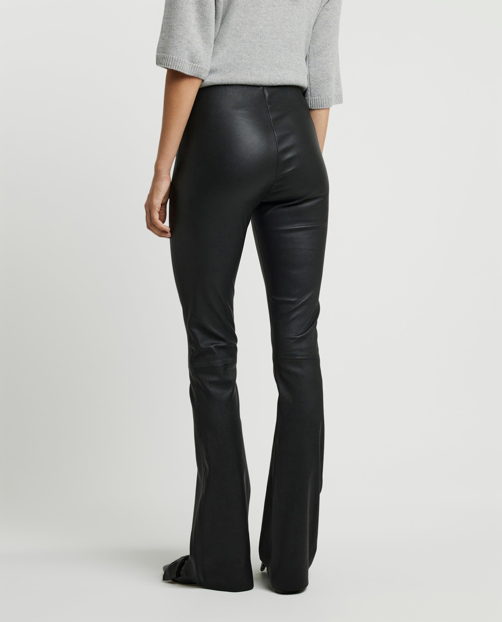 Flared trousers in stretch leather