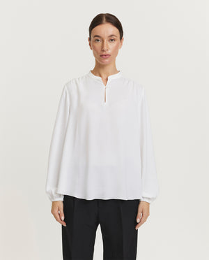 Soepelvallende blouse