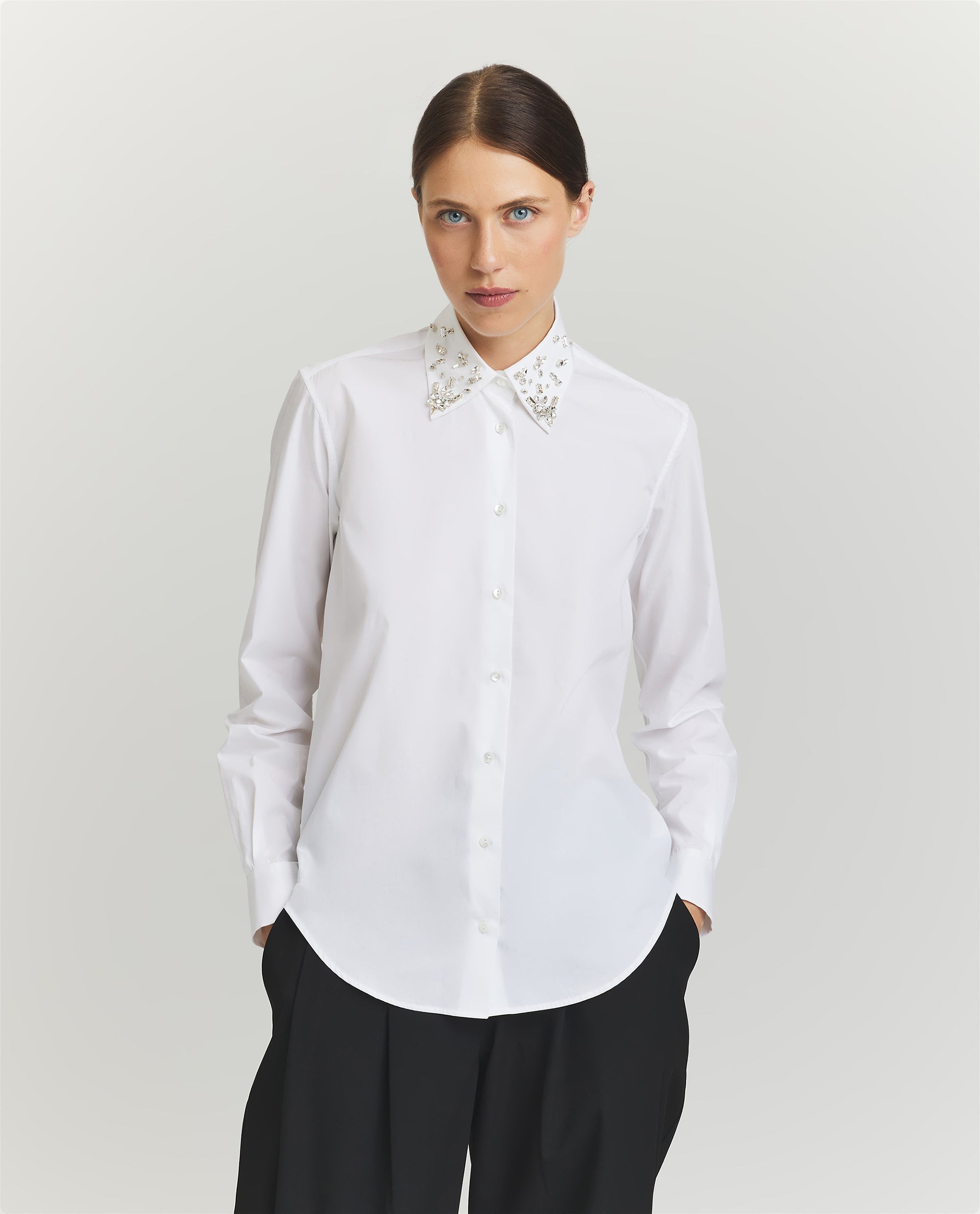 Recht vallende witte blouse