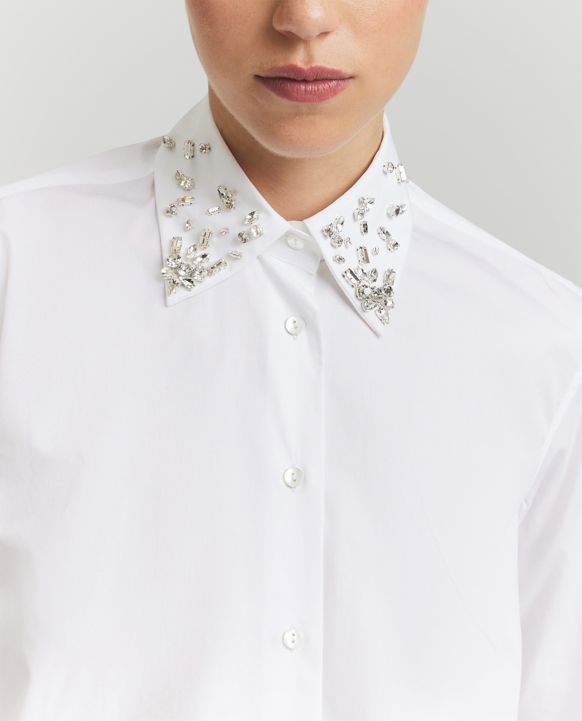 Recht vallende witte blouse