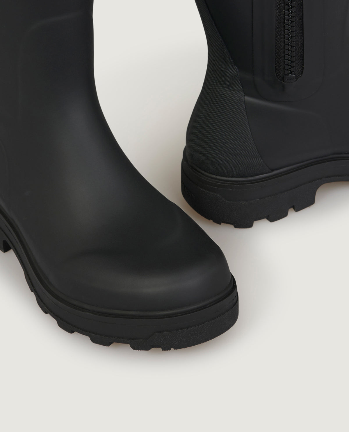 High rubber boots 
