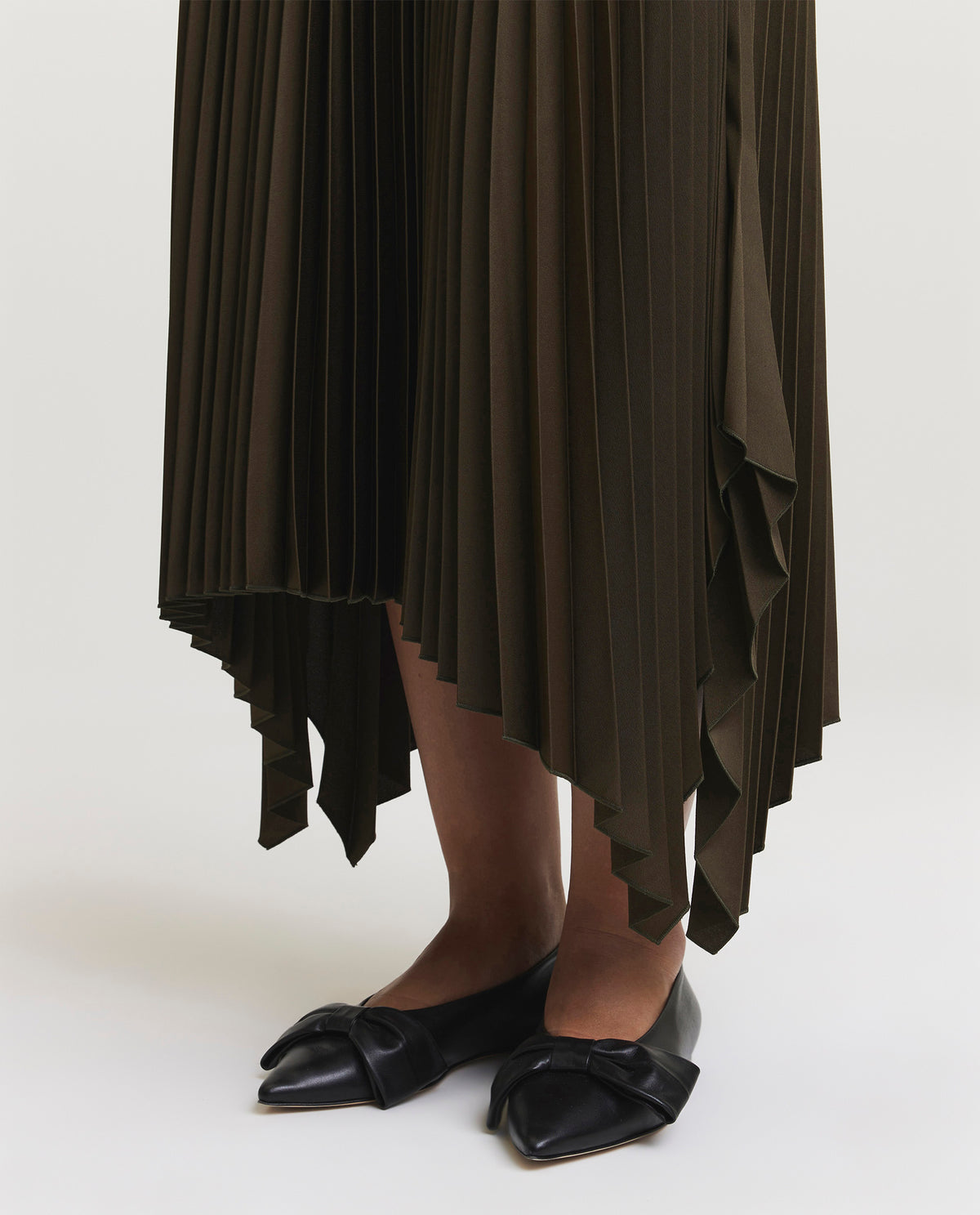 Asymmetrical plissé skirt