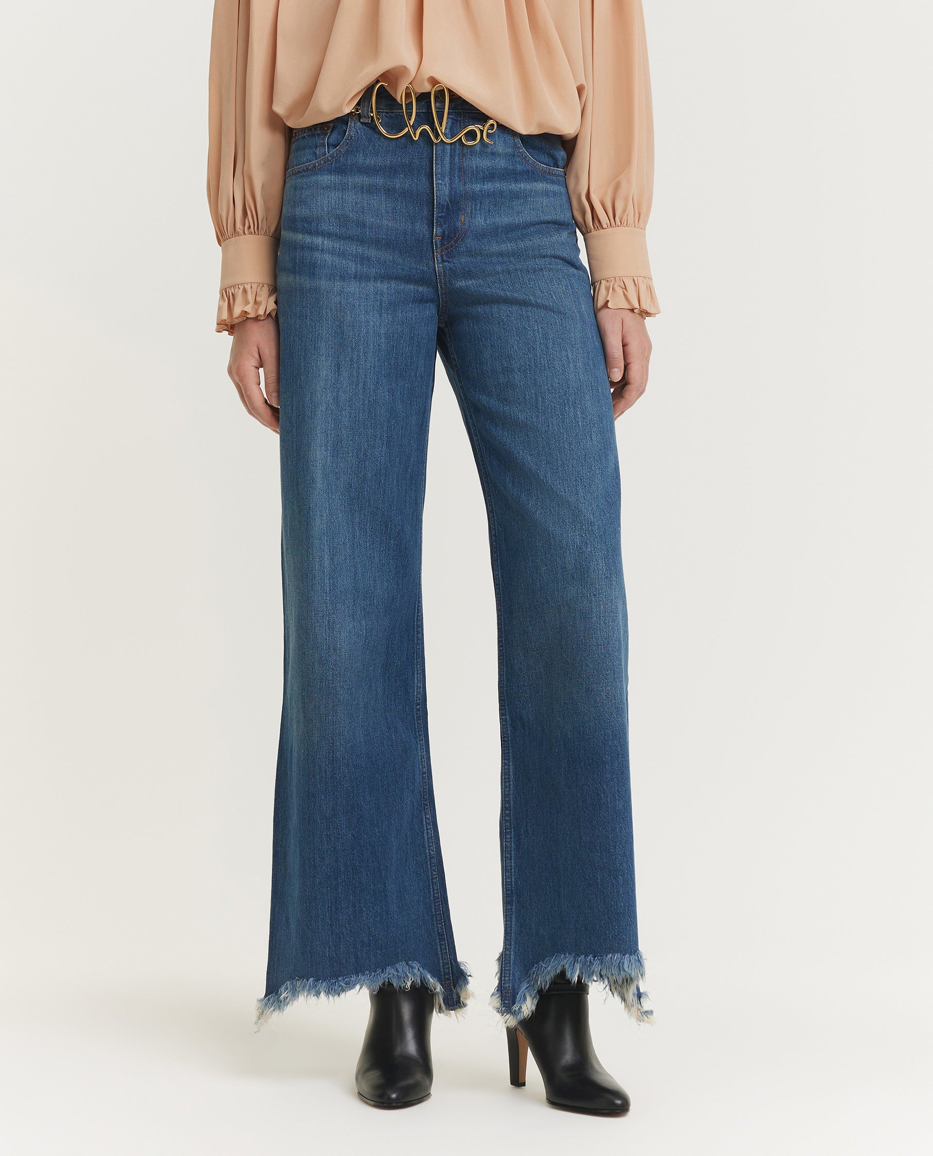Wide Legged Damaged Jeans