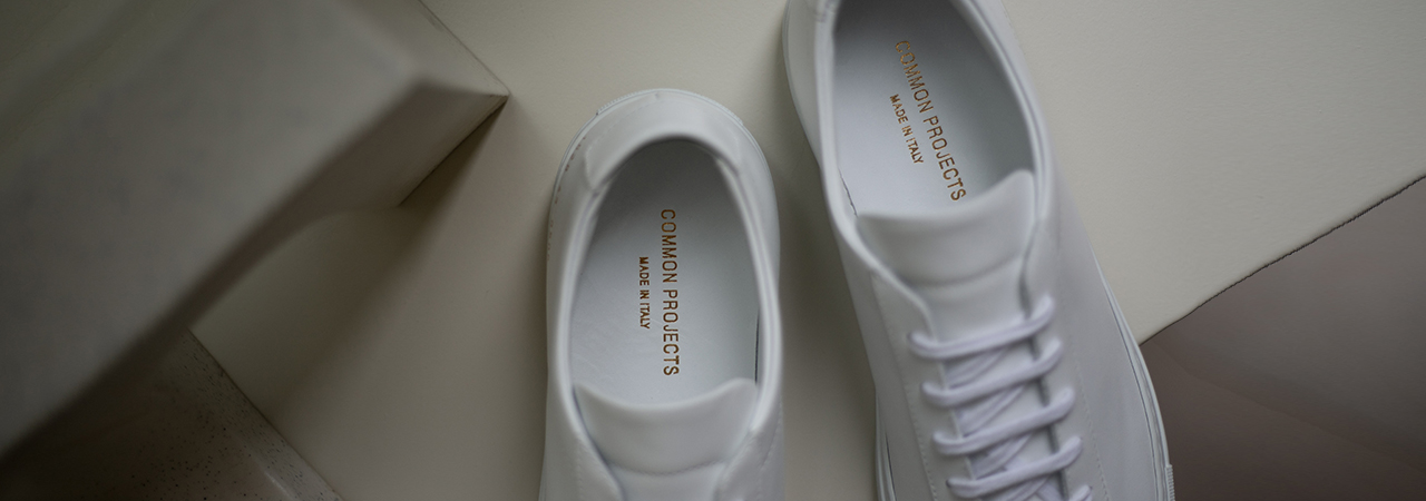 COMMON PROJECTS | Four Hole Leather Sneakers | Women | Lane Crawford