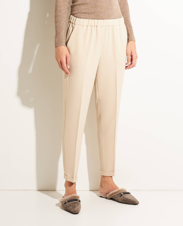 Trousers with pressed creases